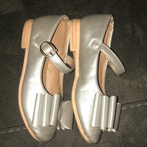 Silver bow shoes